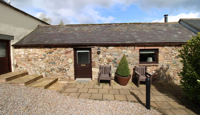 A cottage that sleeps 2 guests in 1 bedroom