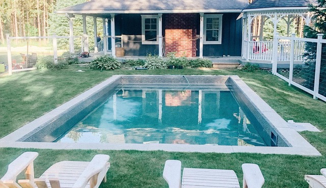 A country home minutes from Creemore with an inground pool and hot tub.