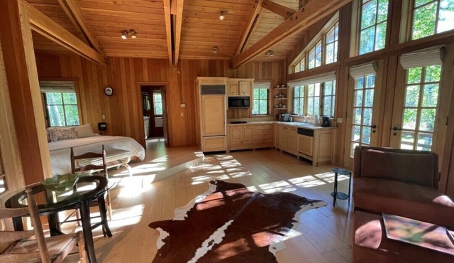 A Cozy Cottage With A King size Bed + A Fire Place