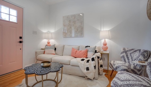 A cozy home and garden cottage situated across from million dollar homes.
