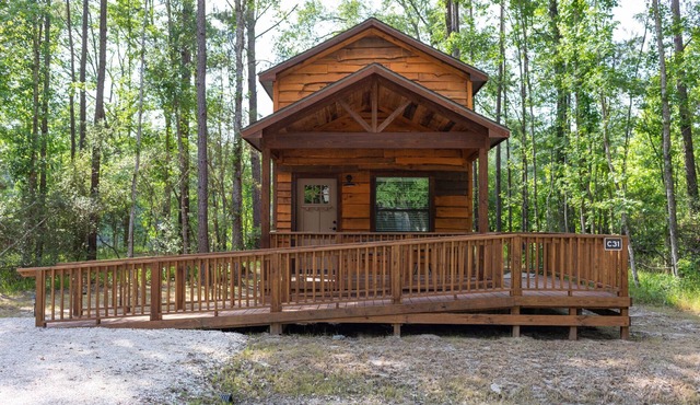 A cozy little ADA accessible getaway right on Kickapoo Creek. Two Creeks Crossing Resort