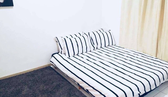 A cozy place to have a short vacation in the City!