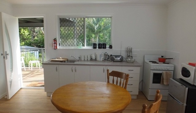 A cute cottage in a forest setting with FREE Wi-Fi