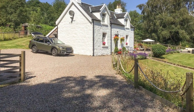 A delicate white washed traditional croft house situated in the stunning West Coast of Scotland.