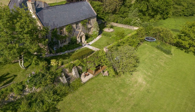 A delightful family farmhouse set in 17 acres of beautiful Dorset countryside.