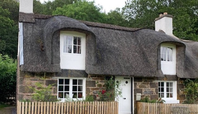 a fairytale thatched highland cottage