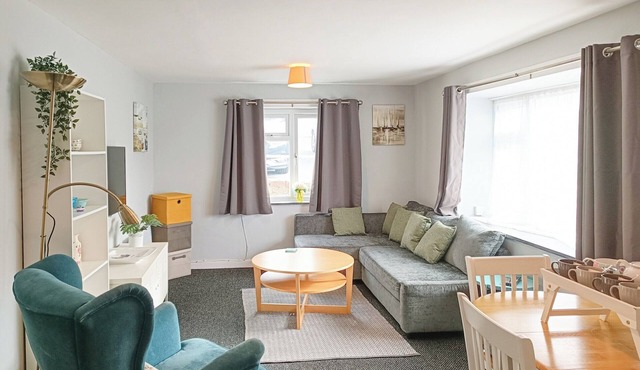 A family friendly apartment just a short stroll from a fabulous sandy beach.