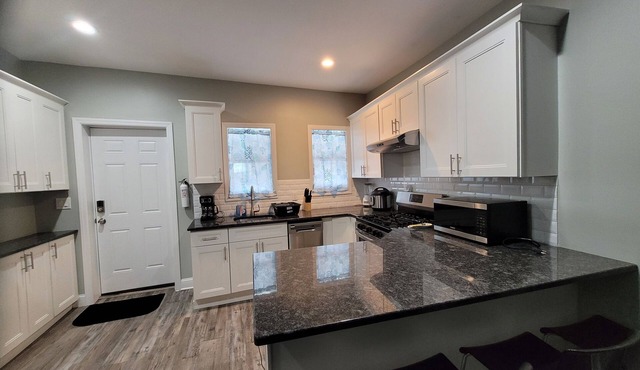 A family type unit in the midst of downtown Somerville crowded by restaurants