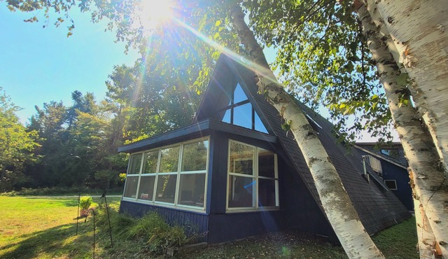 A Frame cabin with a short stroll to a gorgeous sandy beach!