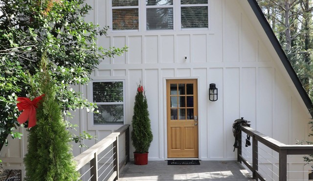A frame cottage with private dock on lake