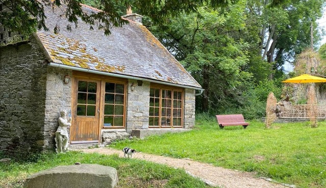 A French countryside detached cottage located in hectares of private land.