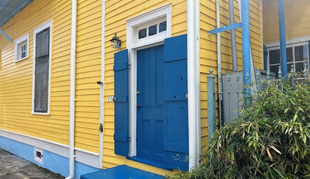 A funky-chic one-bedroom apartment with a private entrance and a full kitchen.