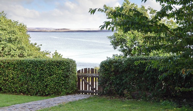 A generously sized property with stunning views across Loch Ewe.