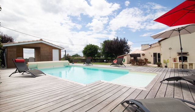 A Gite called La Grange, with garden, BBQ area and heated swimming pool.