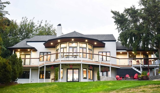 A golf course home with game room and amazing outdoor space.