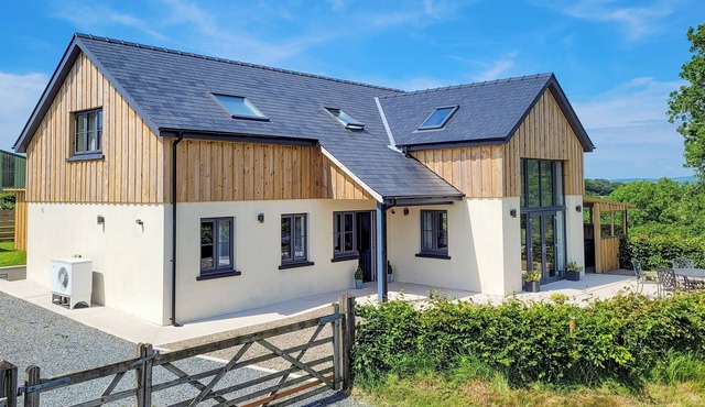 A gorgeous new build property overlooking the rolling Cambrian Mountains.