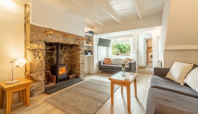 A Grade II listed, three-storey cottage that's been tastefully refurbished.