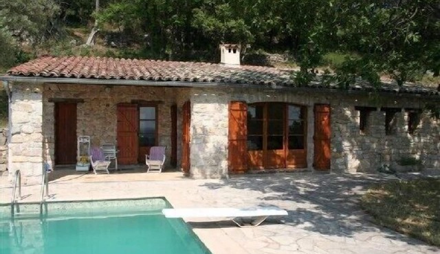 A haven of peace in a wild setting with an olive grove garden pool