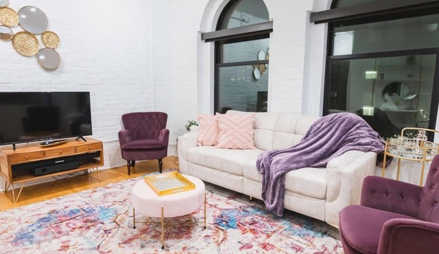 A historic beautifully detailed suite, 1,300 square foot, corner loft in the heart of the Old Market