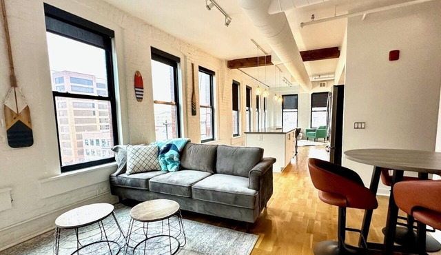 A historic beautifully detailed suite, 1,300 square foot, corner loft in the heart of the Old Market