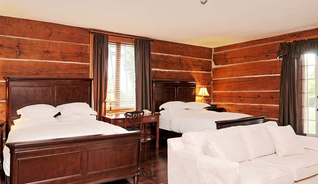 A Historic, Luxurious, Waterfront Log Mansion