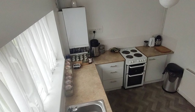 A house w' good amenities near a park sometimes shared with me or another guest