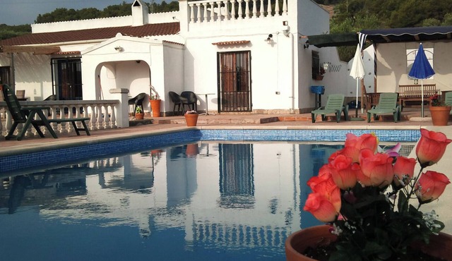 A house with a big pool year fantastic views