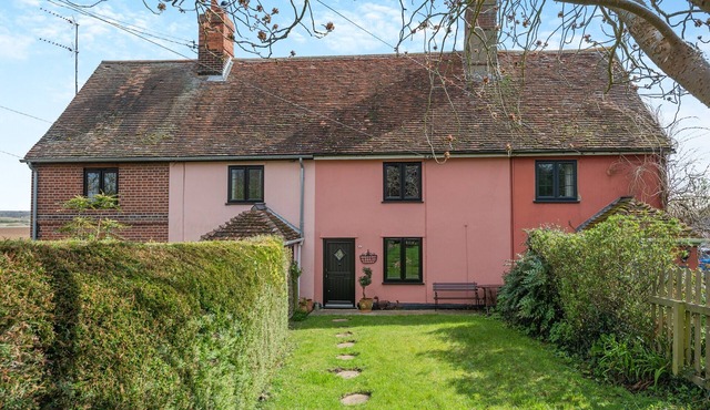 A humble, cute country cottage with views over the river.