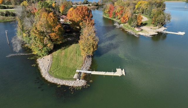 A lake home on a private peninsula located on Schmidt Lake in Buffalo.