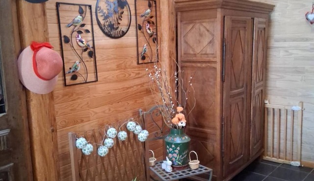 A large gîte all dressed in wood inside, with a lovely decor.