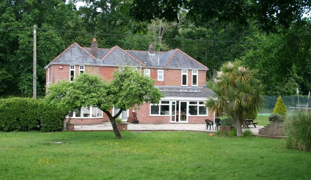 A large house in grounds, in the New Forest National Park and close to the sea