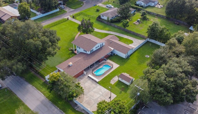 A Large Tropical Estate (Over 1.5 Acres of space) by RedAwning