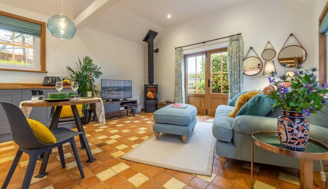 A light and airy property with a hammock and hot tub, situated on a working farm