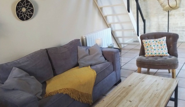 A loft feel for this charming, quiet apartment in a seaside village