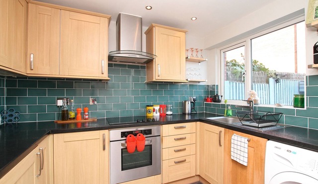 A lovely modern family/pet friendly house right on the beach