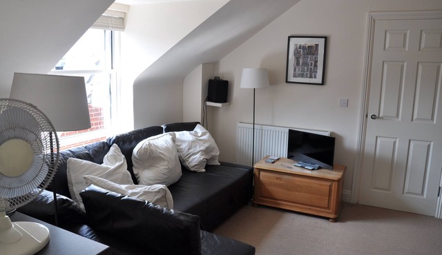 A lovely quiet new flat 50 yards from the beach in the centre, parking included.