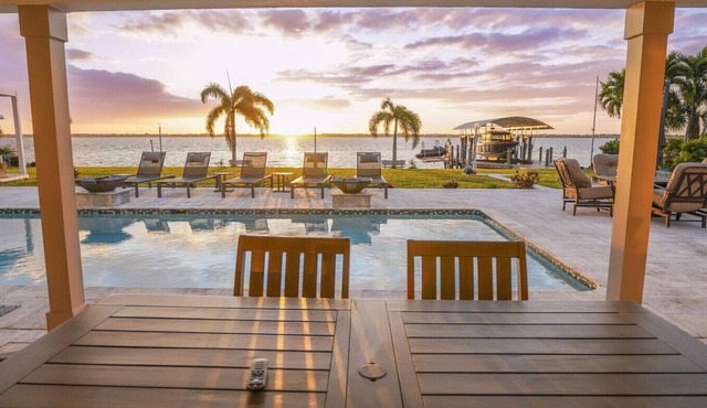 A Luxurious 4BR/4BA waterfront wellness retreat with saltwater pool, sauna, cold plunge