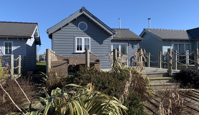 A luxury 2 bed beach house or lodge that sleeps 6 guests in 2 bedrooms