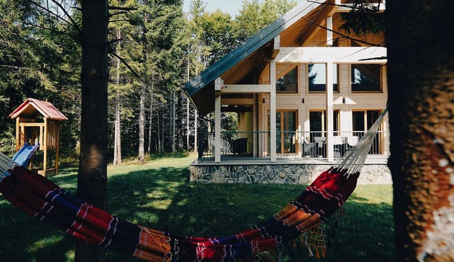 A luxury mountain cabin in Stari Laz featuring a finnish sauna