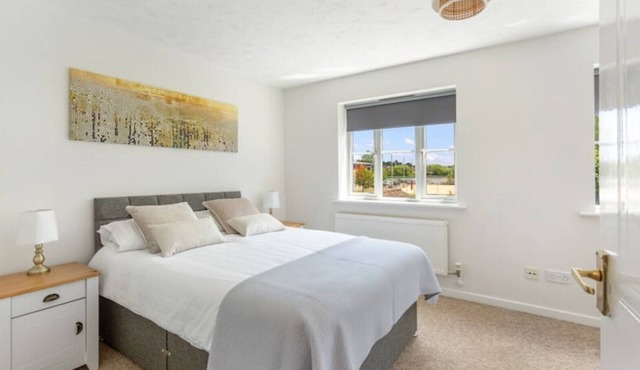 A modern, bright and clean home, in prime location with private parking!