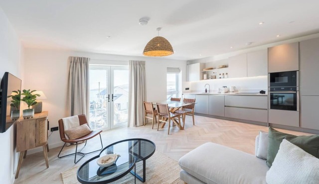 A modern costal apartment in the scenic Bull Bay, offering stunning coastal views for up to 4 guests