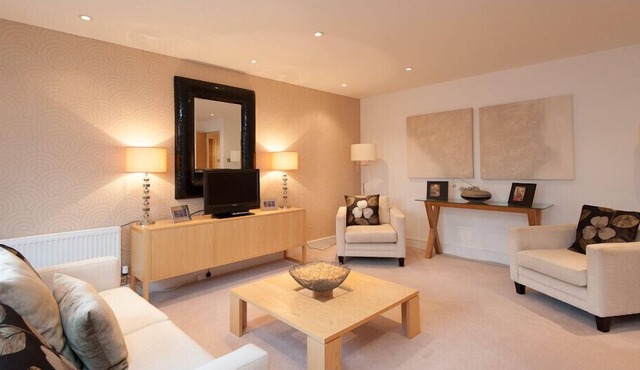 A modern open plan two-bedroom apartment, sleeping 4.