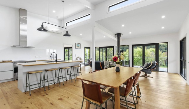 A modern riverside abode close to the beach