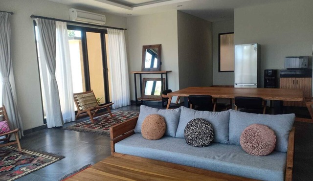 A modern three-bedroom villa with a private pool in a quiet area of Canggu.