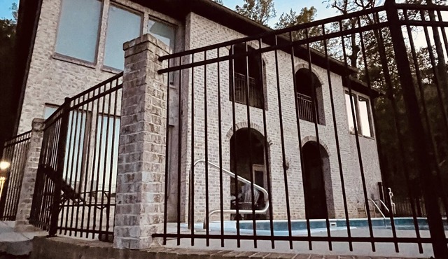 A NEWER UPSCALE LAKEFRONT HOME WITH POOL