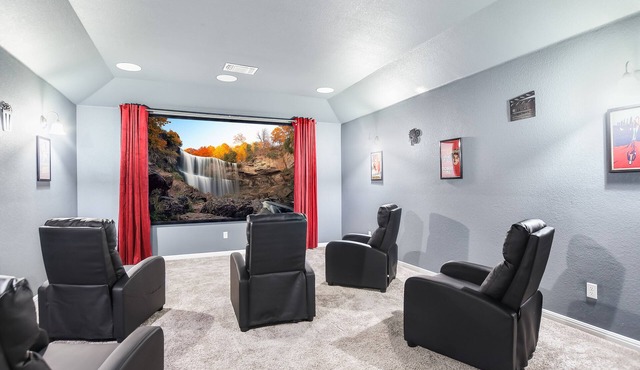 A Night at the Cinema 5 bedrooms, 2.5 bathroom. Theater room and game room