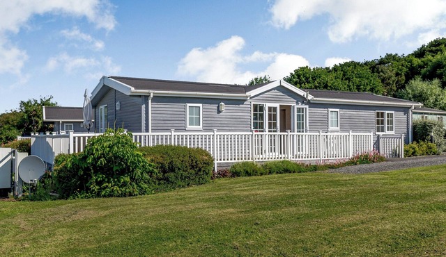 A Nordic Style 6 berth Luxury Lodge with raised veranda on 3 sides.