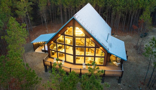 A one-of-a-kind architectural masterpiece with massive window wall with view!