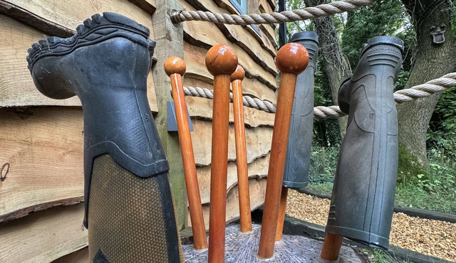 A peaceful countryside retreat with a private hot tub and cozy log burner.