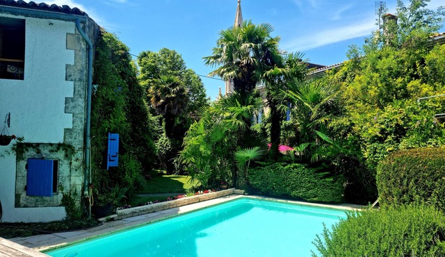 A pretty cottage with pool and lovely garden in a village close to sea .